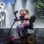 Girl with SMA takes selfie with her brother